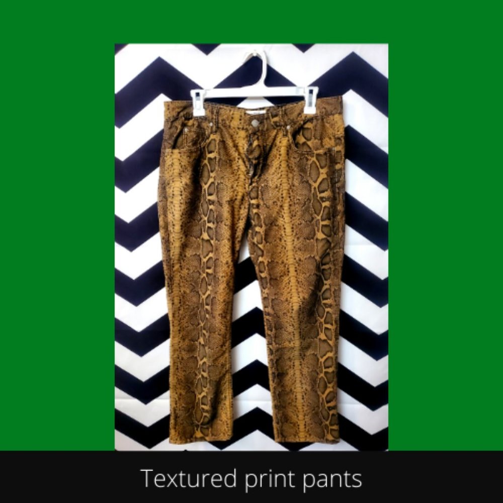 animal print textured corduroy pants